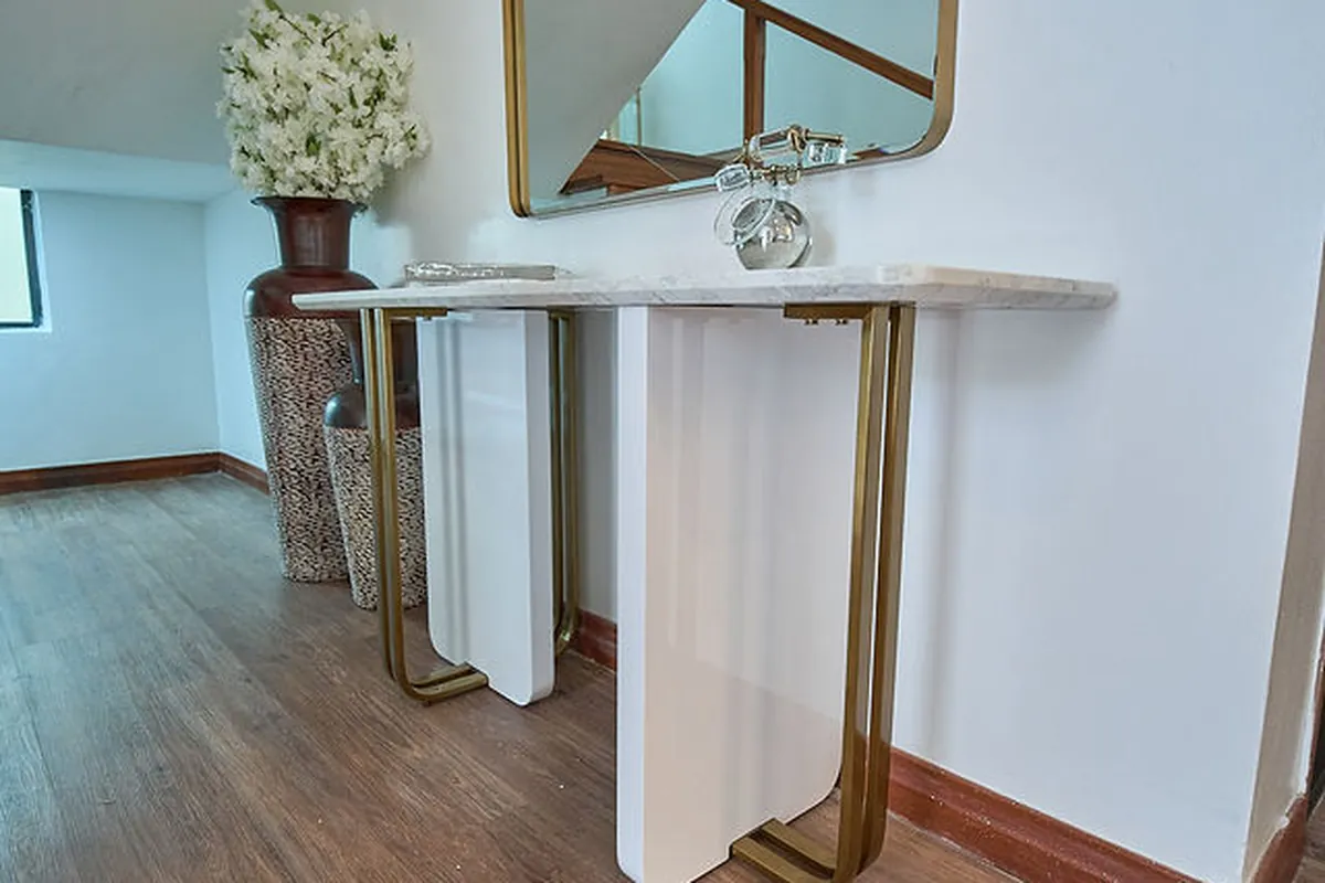 Refined hospitality seating area with layered lighting