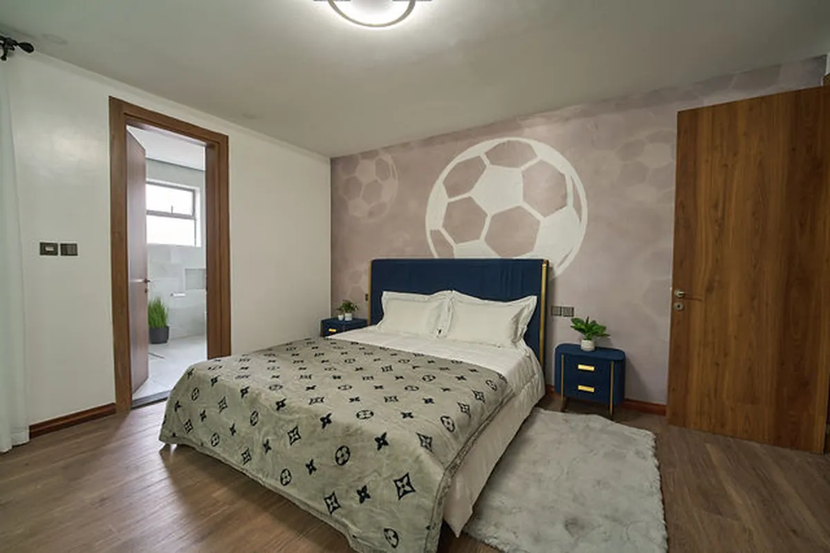 Walk-in closet system with custom shelving and soft task lighting