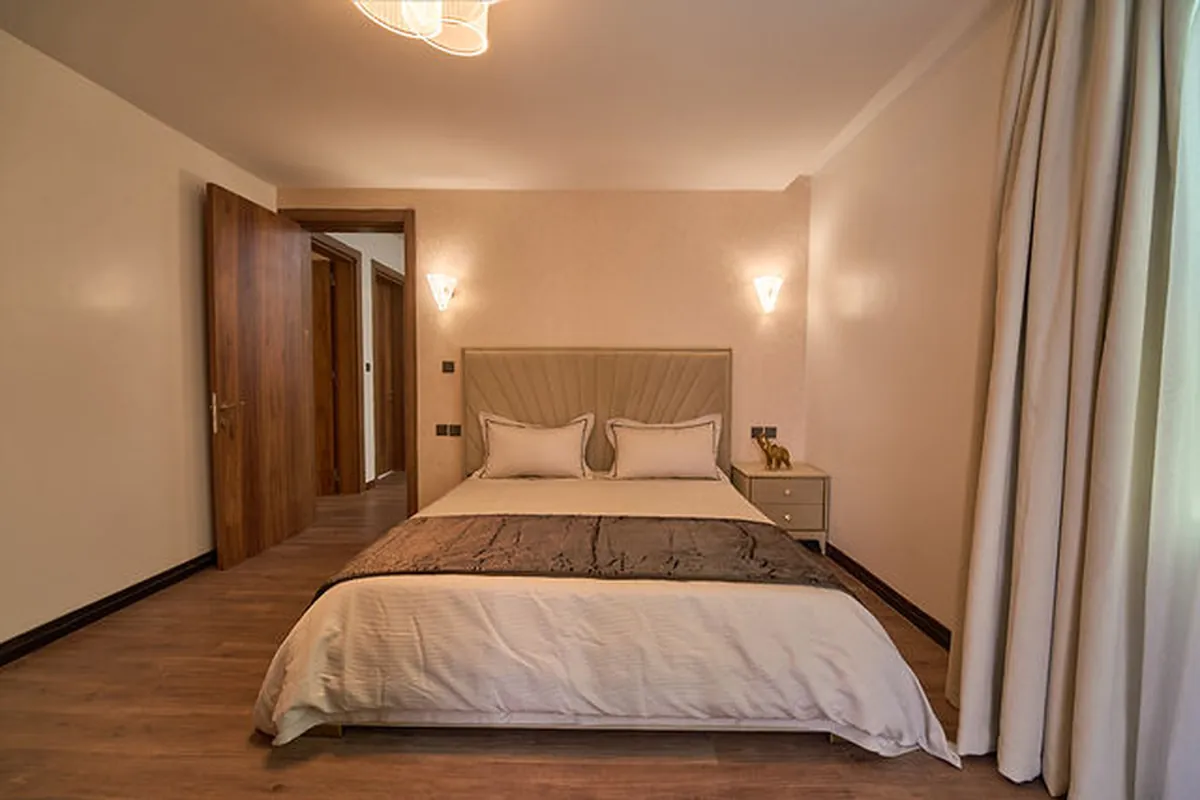 Ensuite bathroom with spa-inspired finishes and freestanding soaking tub