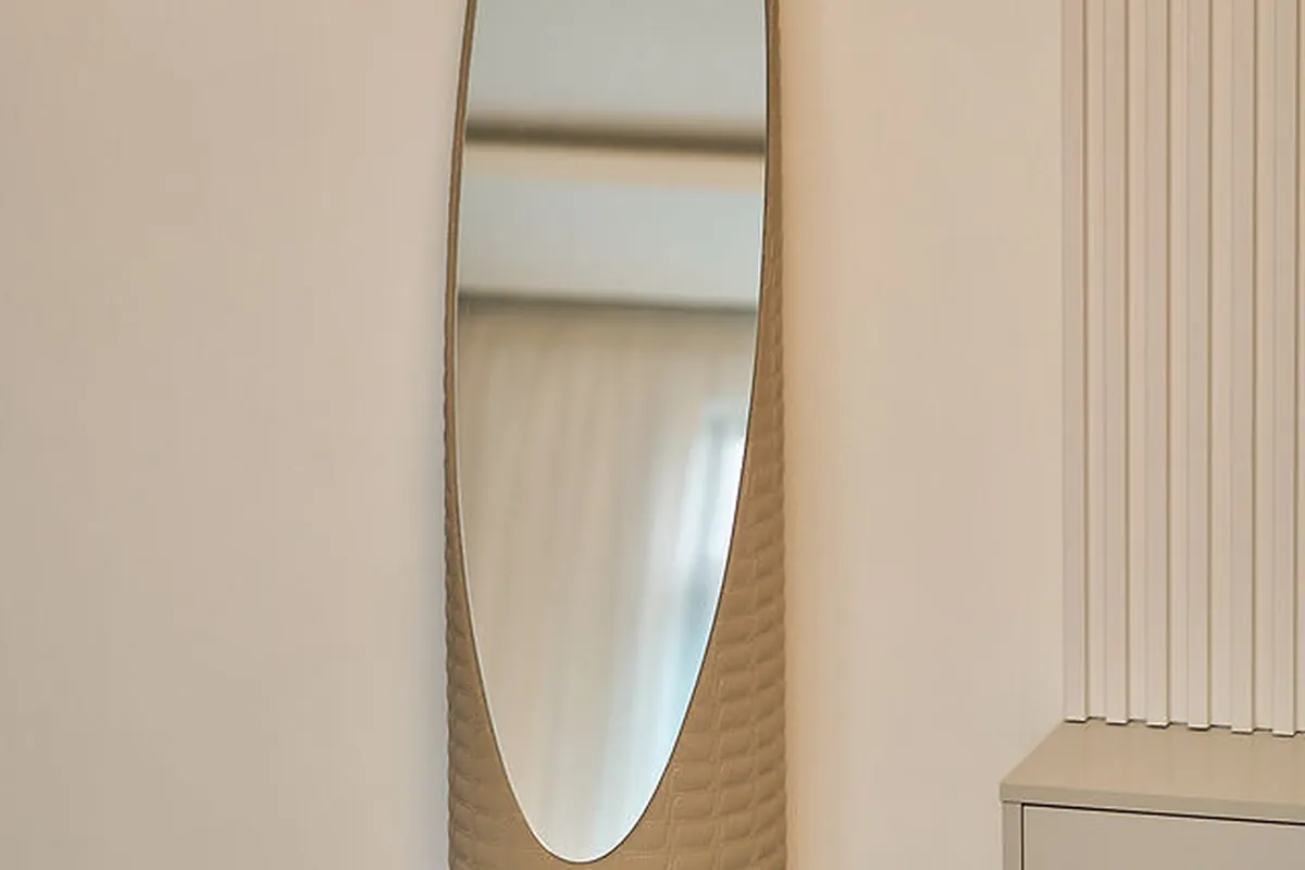 Balcony edge with soft furnishings and panoramic city view integration