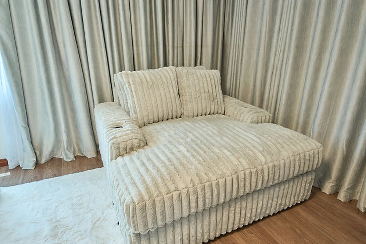 Material palette vignette featuring natural stone, brushed metals, and linen